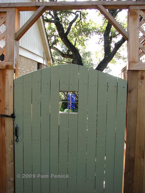 Peek-a-boo gate with bottle tree view