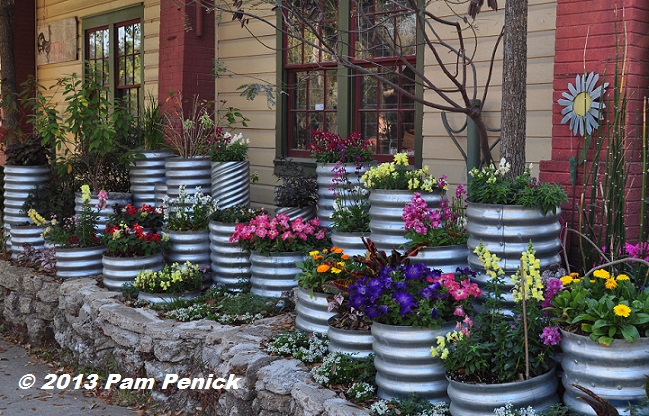 Drive-By Gardens: Colorful culvert pipe planters in Houston Heights