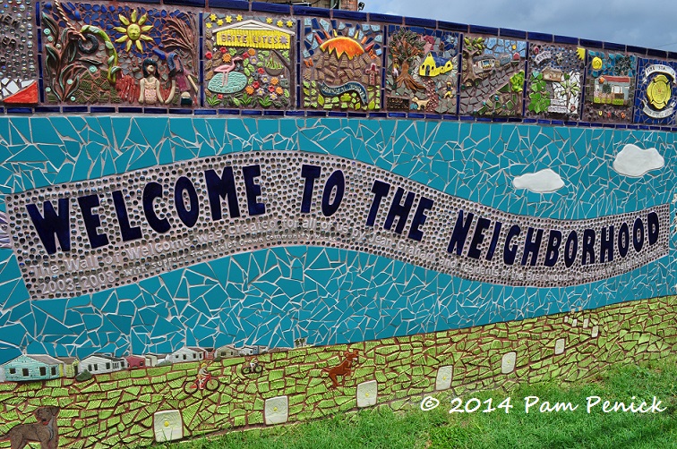 Mosaic wall artfully, joyfully shares a neighborhood's history