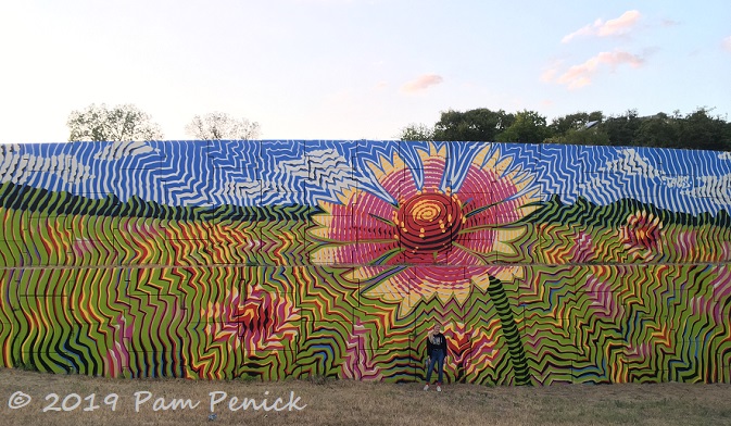 Wildflower mural energizes wall on Wood Hollow Drive