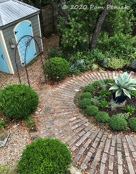 Image of Large circle garden bed made of stone